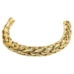 Cartier 106 grammes Bracelet à larges maillons tressés en or jaune 18K