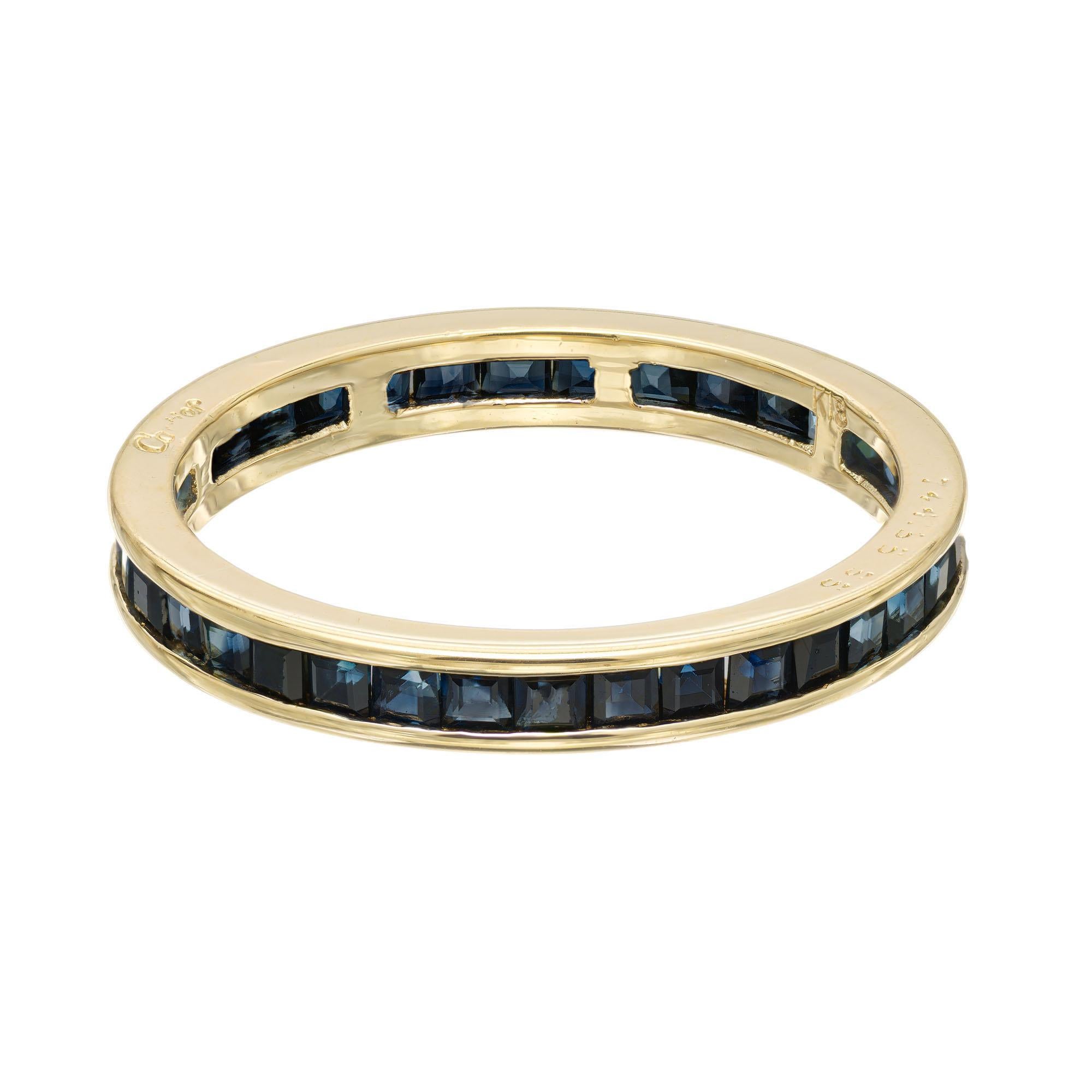 Cartier sapphire wedding band ring. 36 square channel set sapphires in a 18k yellow gold eternity setting. 

36 square cut sapphires approx. total weight. 1.10cts.
Size: 6.75
18k yellow gold
Weight: 2.5 grams
Stamped: Cartier