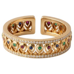 Cartier 13 Carat 18K Gold Diamond & Emerald, Ruby Blue Sapphire Bangle