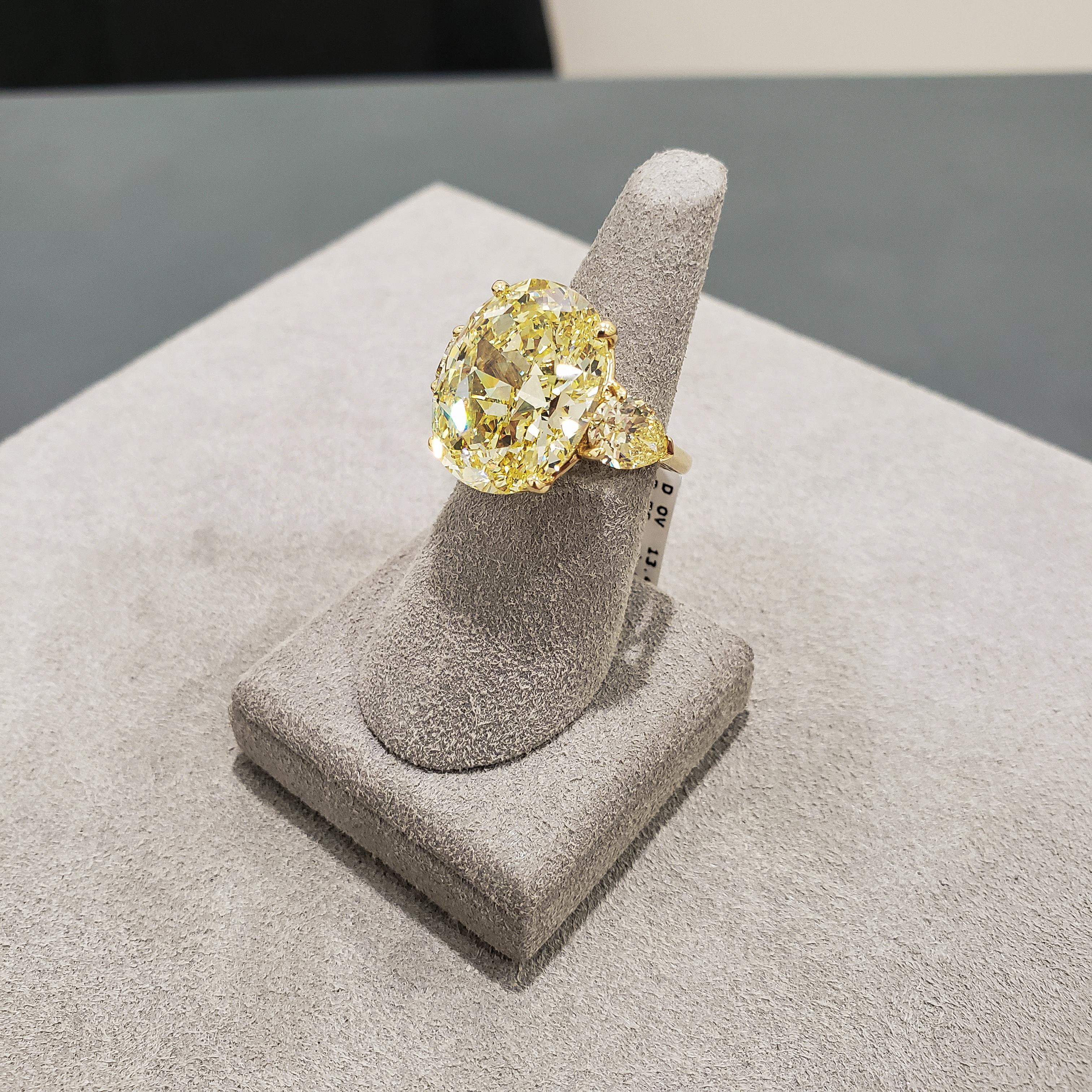 Women's GIA Certified 13.46 Carats Oval Cut Fancy Intense Yellow Diamond Engagement Ring For Sale