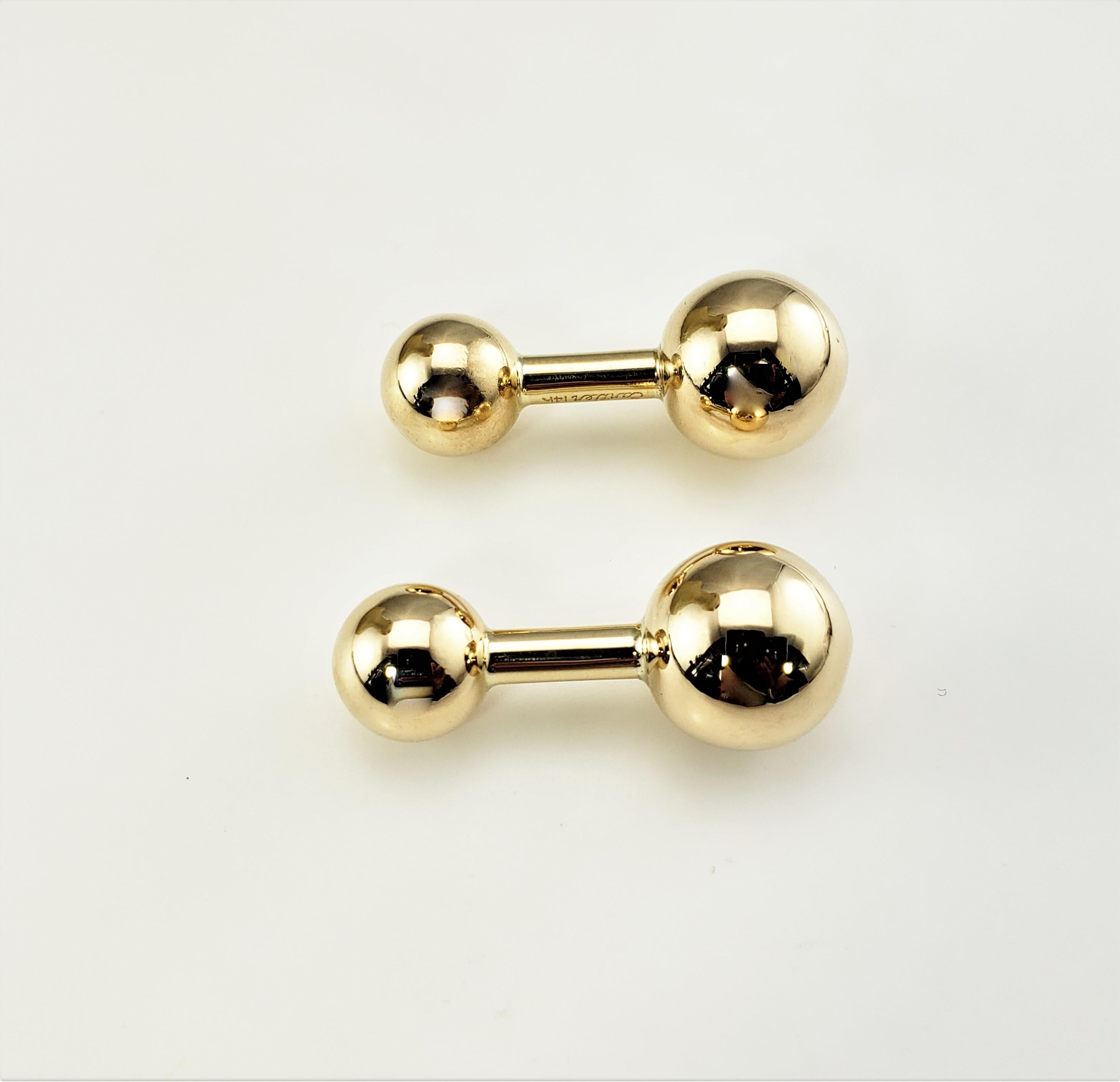 Cartier 14 Karat Yellow Gold Barbell Cufflinks-

These elegant Cartier cufflinks are crafted in meticulously detailed 14K yellow gold.

Size: 30 mm x 12 mm

Weight:  5.9 dwt. /  9.2 gr.

Hallmark:  Cartier 14K

Very good condition, professionally