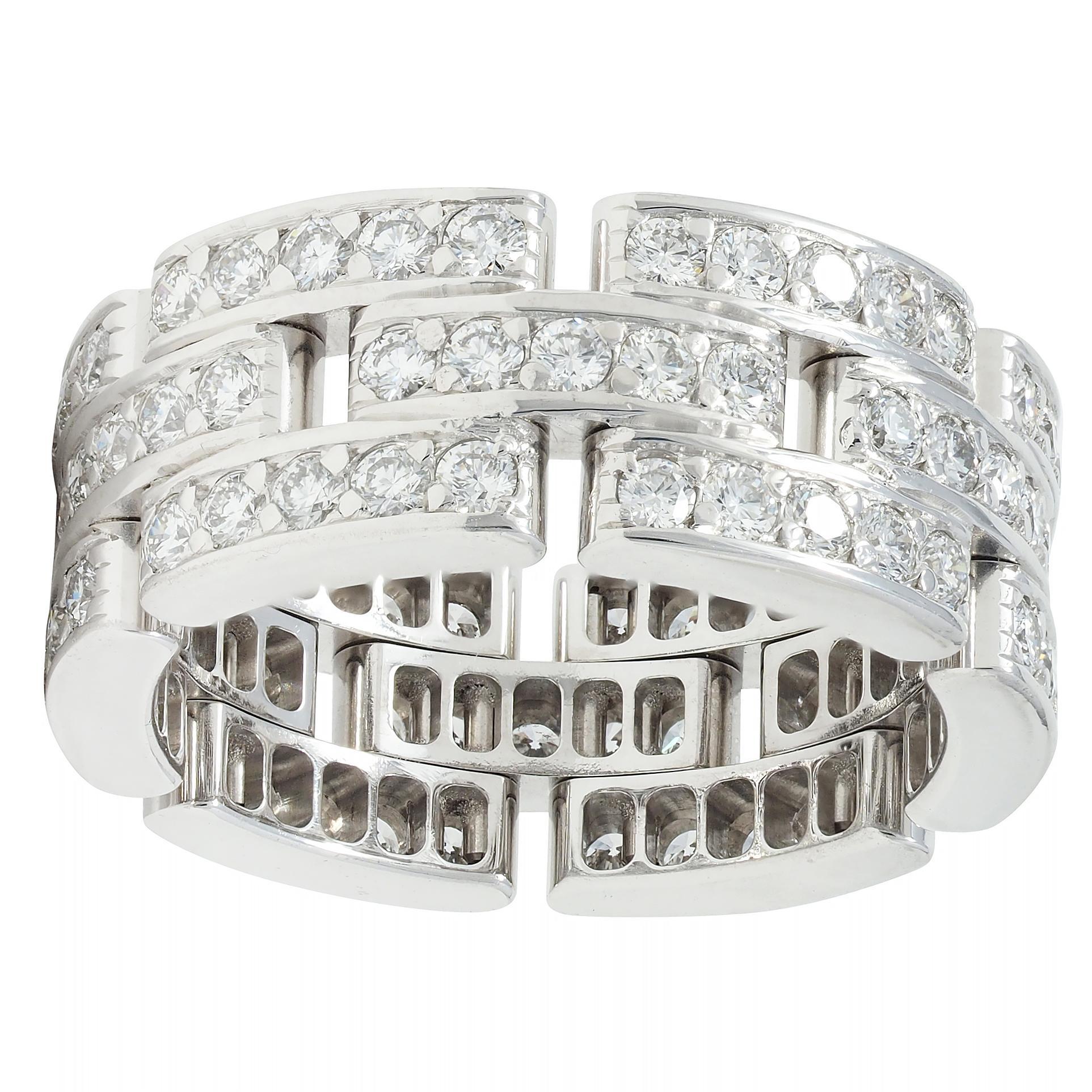 Designed as a wide band pierced with a panther link motif
Bead set throughout with round brilliant cut diamonds
Weighing approximately 1.40 carats total 
F/G color with VS1 clarity
Completed by high polish edges
Stamped for 18 karat gold
Numbered