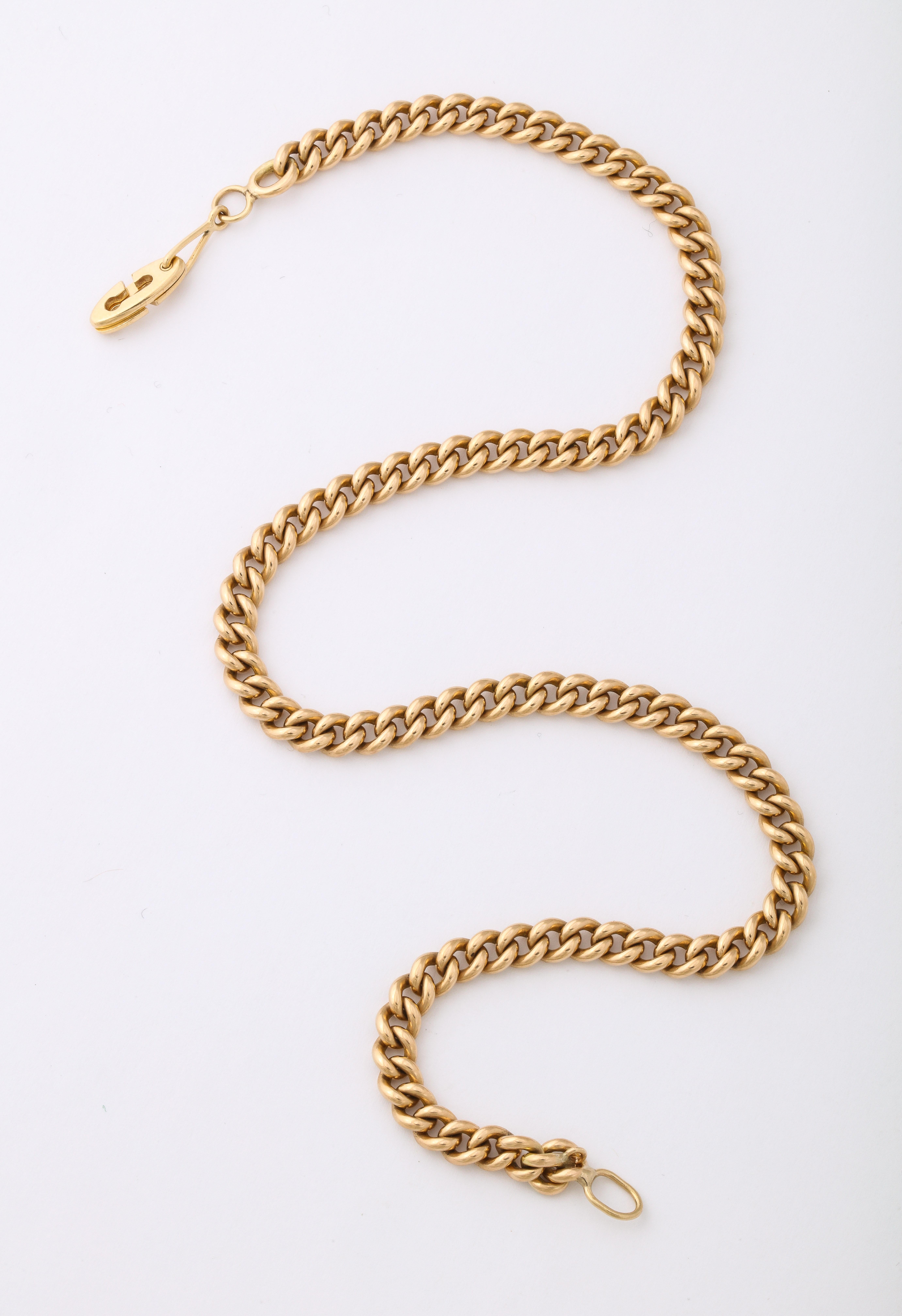 Signed Cartier 14K gold curb link chain necklace. 

14