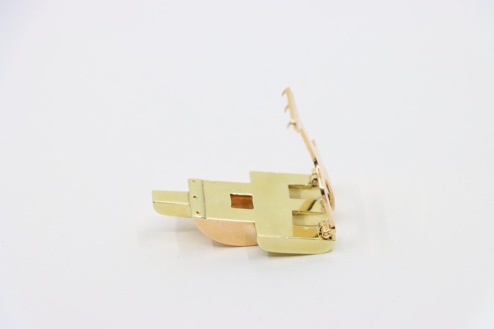 Cartier, clip fourrure pyramide en or rose et jaune 14 carats en vente 8