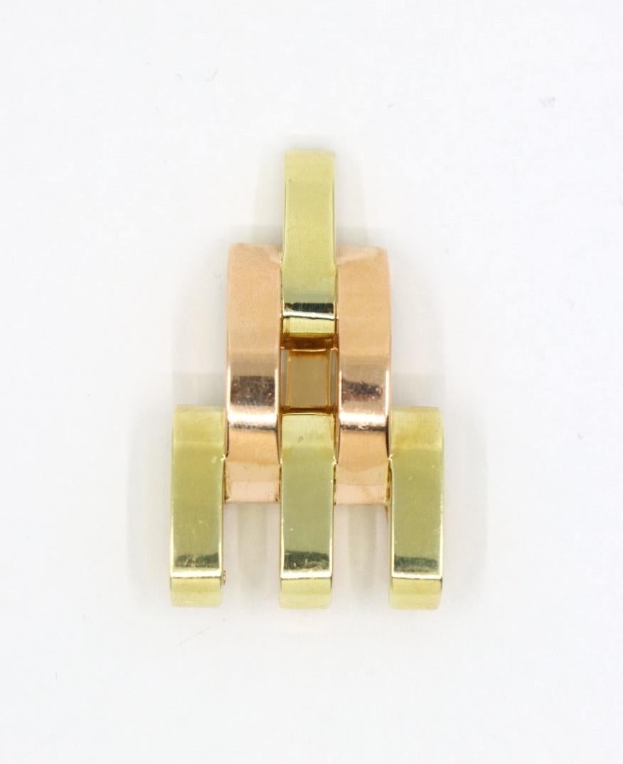 Cartier, clip fourrure pyramide en or rose et jaune 14 carats Unisexe en vente