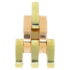 Cartier, clip fourrure pyramide en or rose et jaune 14 carats