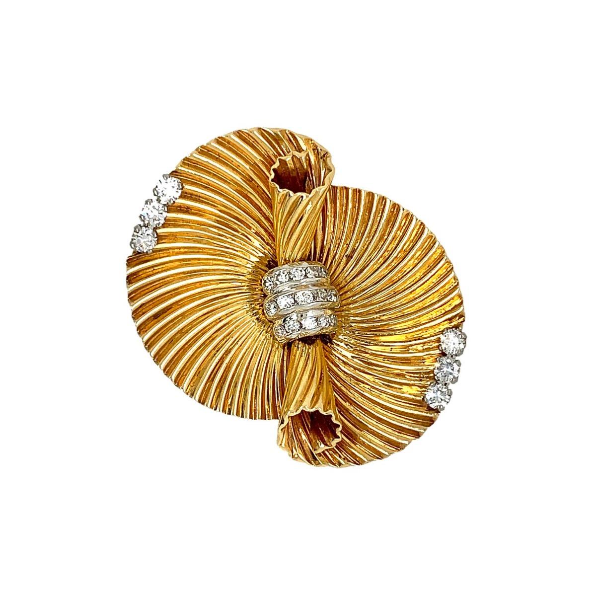 Brand: Cartier
Metal: 14k Yellow Gold
Year Of Manufacture: 1940s
Gemstone: Diamond
Diamonds Used: 21
Diamond Weight: 0.60 CT
Total Weight: 15.5 grams