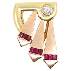 Cartier Clip in oro giallo e rosa 14k con diamante e rubino