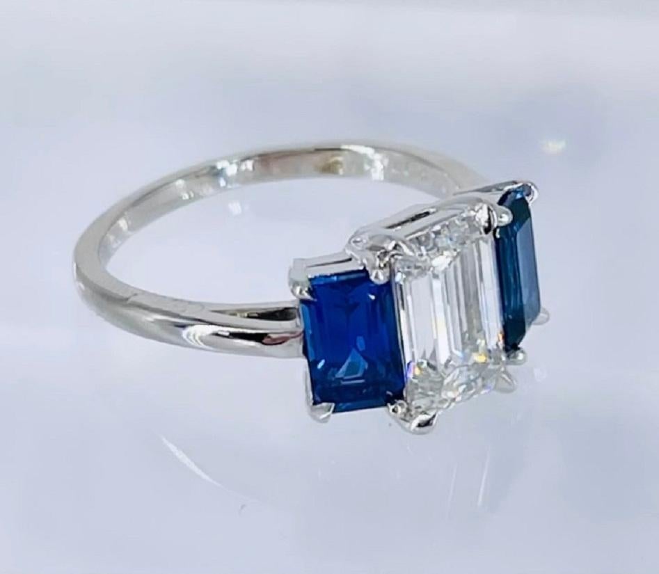 This sophisticated and unique Cartier ring would be a one of a kind engagement ring or perfect as a right hand statement piece. This ring 
showcases a stunning 1.55 carat emerald cut diamond, certified by GIA as F color and VVS1 clarity. The diamond
