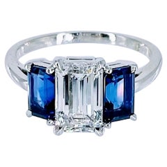 Cartier 1.55 carat GIA FVVS1 Emerald Cut Diamond Three Stone Ring with Sapphires