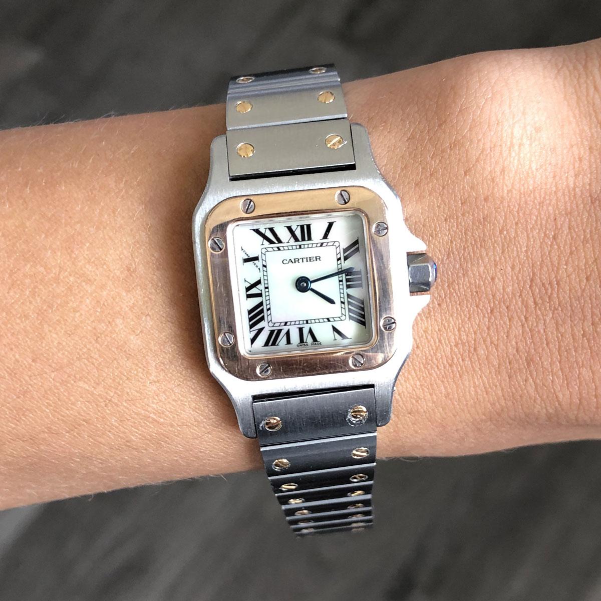 Brand: Cartier
MPN: 1567
Model: Santos Galbee
Case Material: 18k rose gold and Stainless steel
Case Diameter: 24mm
Crystal: Sapphire crystal
Bezel: Smooth yellow bezel with stainless steel
Dial: White Mother of Pearl dial with roman numerals and