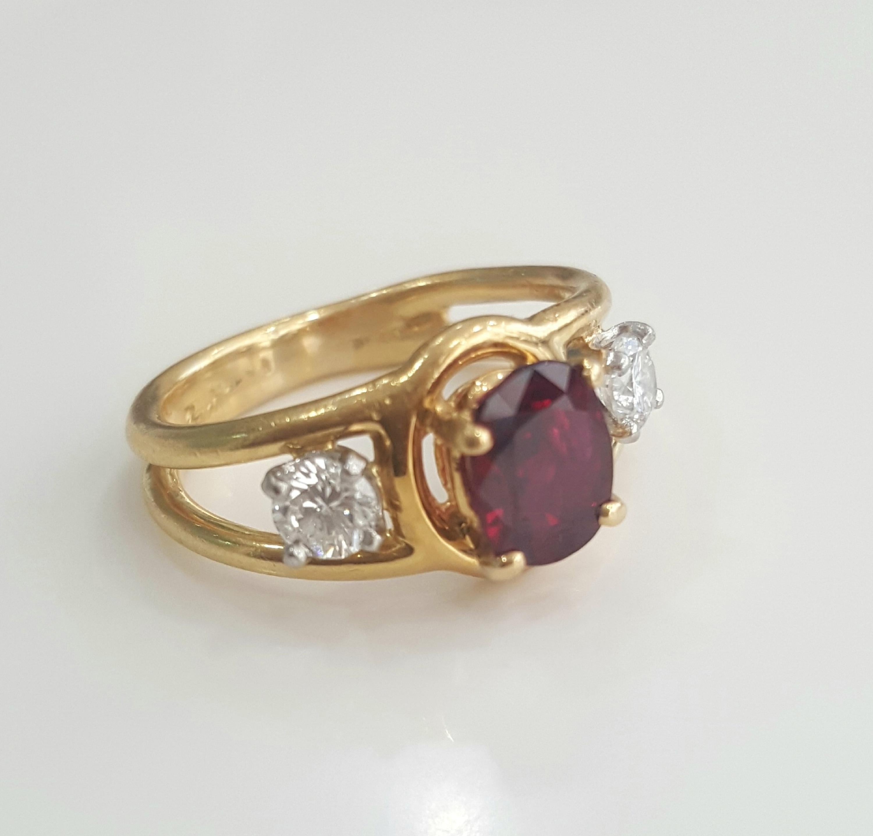 Victorian  Cartier 1.70 Carat Natural Oval Ruby Heat and White Diamond Ring in 18 Karat.