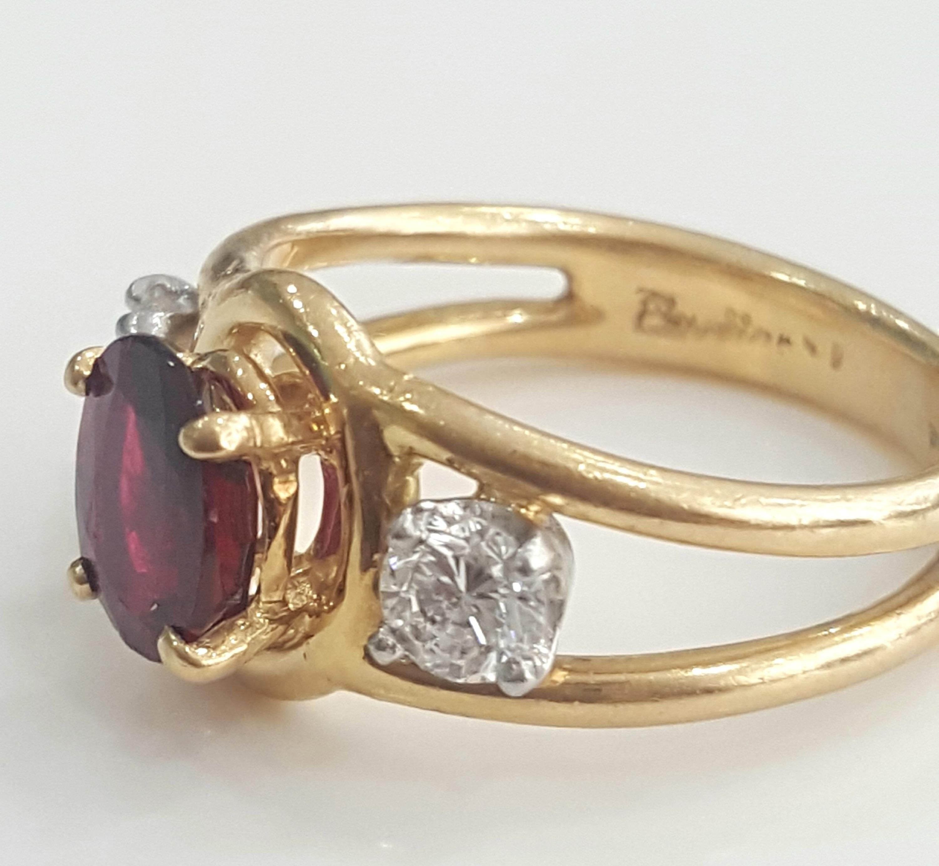 Oval Cut  Cartier 1.70 Carat Natural Oval Ruby Heat and White Diamond Ring in 18 Karat.