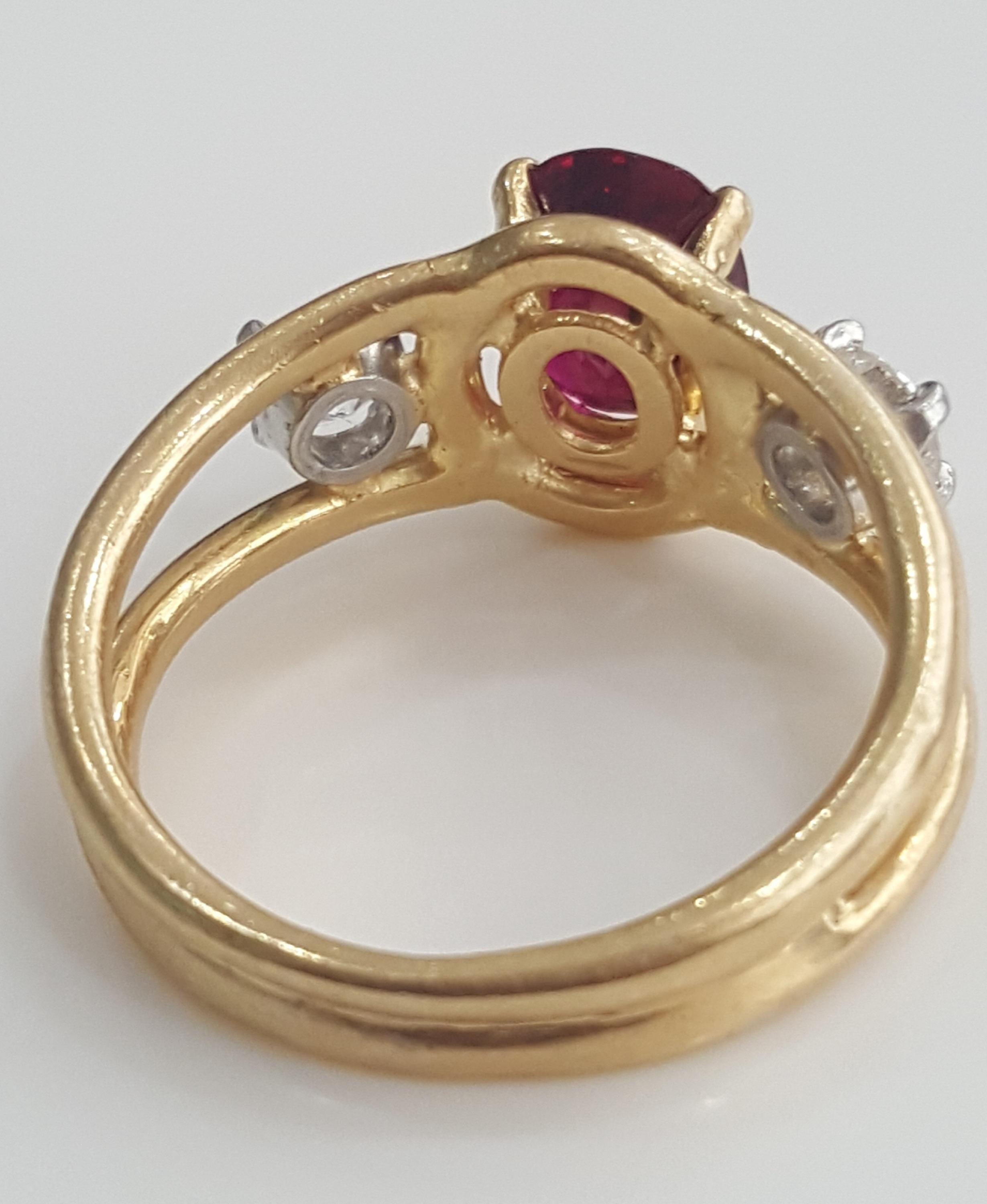  Cartier 1.70 Carat Natural Oval Ruby Heat and White Diamond Ring in 18 Karat. In Excellent Condition In New York, NY