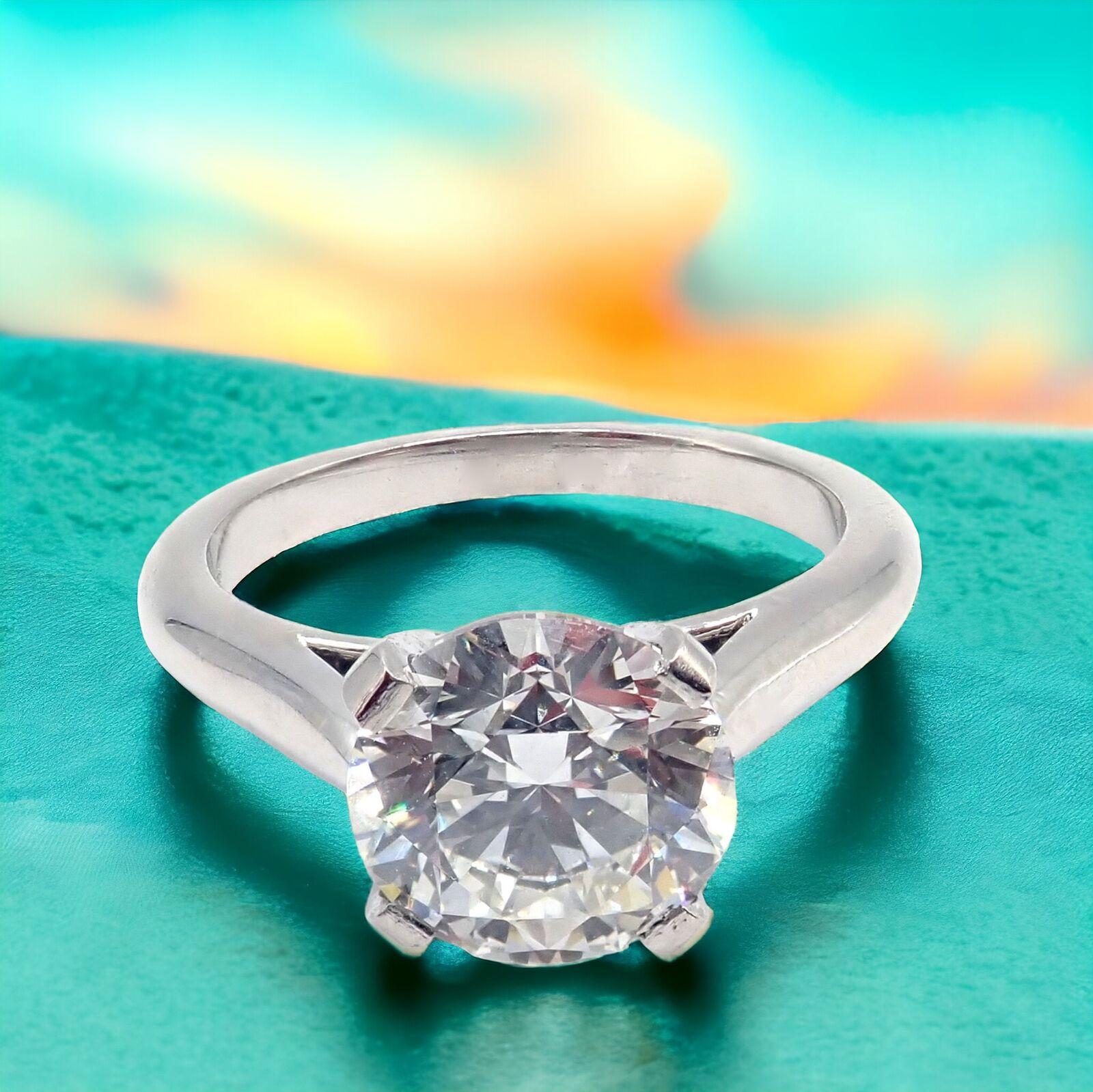 Platinum 1.70ct Diamond Engagement Solitaire Ring by Cartier. 
An authentic Cartier engagement ring, crafted from premium platinum, showcases a stunning 1.70-carat diamond with an impressive VVS1 clarity and H color grade. 
This solitaire ring