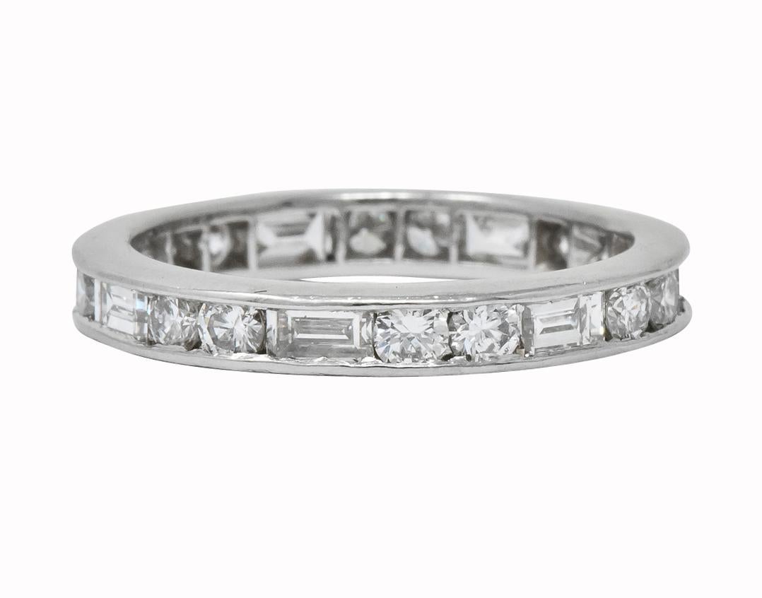 Set all the way around with alternating channel set round brilliant cut and baguette cut diamonds

Round brilliant cut diamonds weigh approximately 1.00 carat total, G/H color and VS clarity

Baguette cut diamonds weigh approximately 0.75 carat
