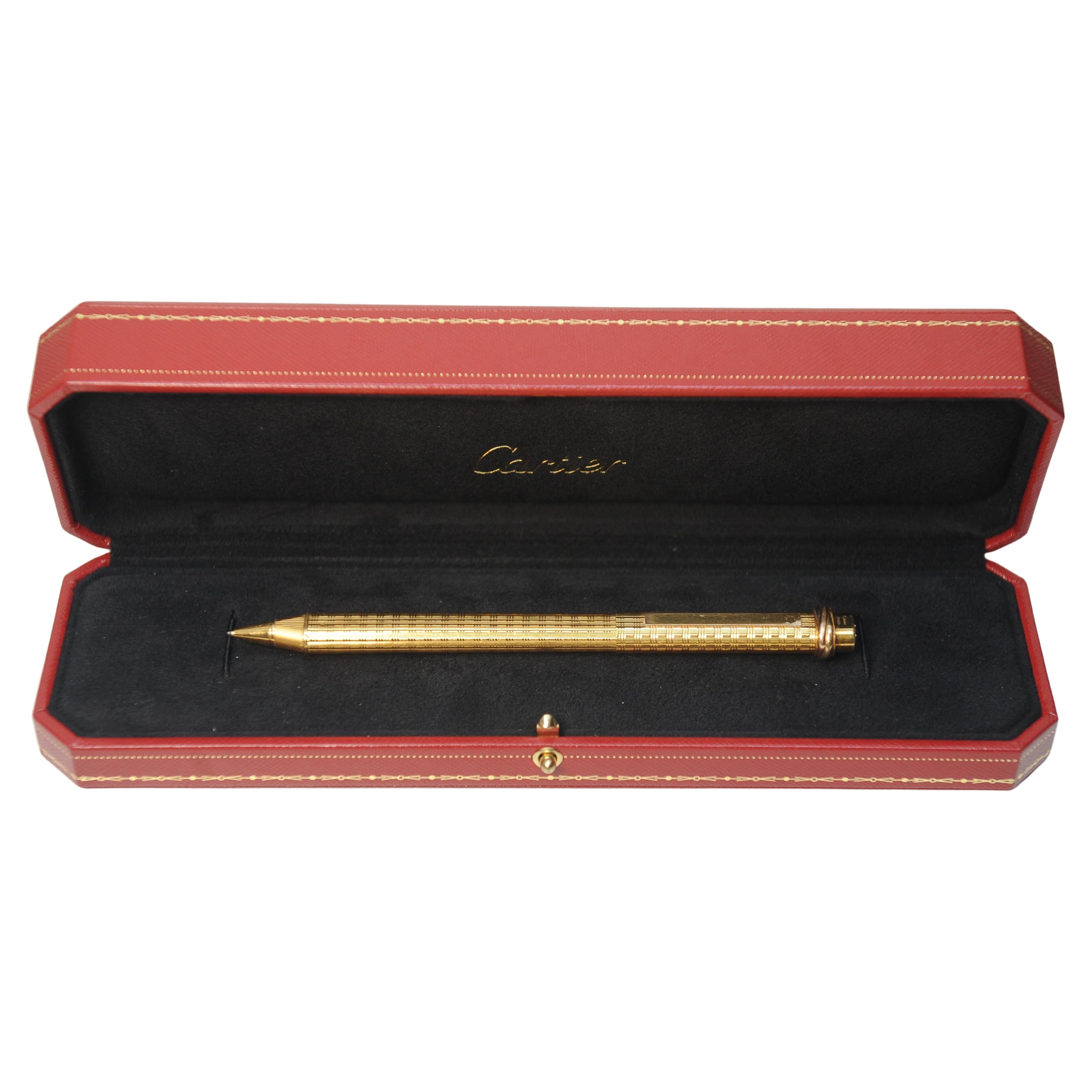 Elegant Cartier 18 Carat Gold Plated Trinity Vendome Ballpoint Pen With Red Leather Cartier Box

Case is different from one in main image will be the standard cartier pen case with cushioned white interior

Weight Of Pen 23g, Made In France

Cartier