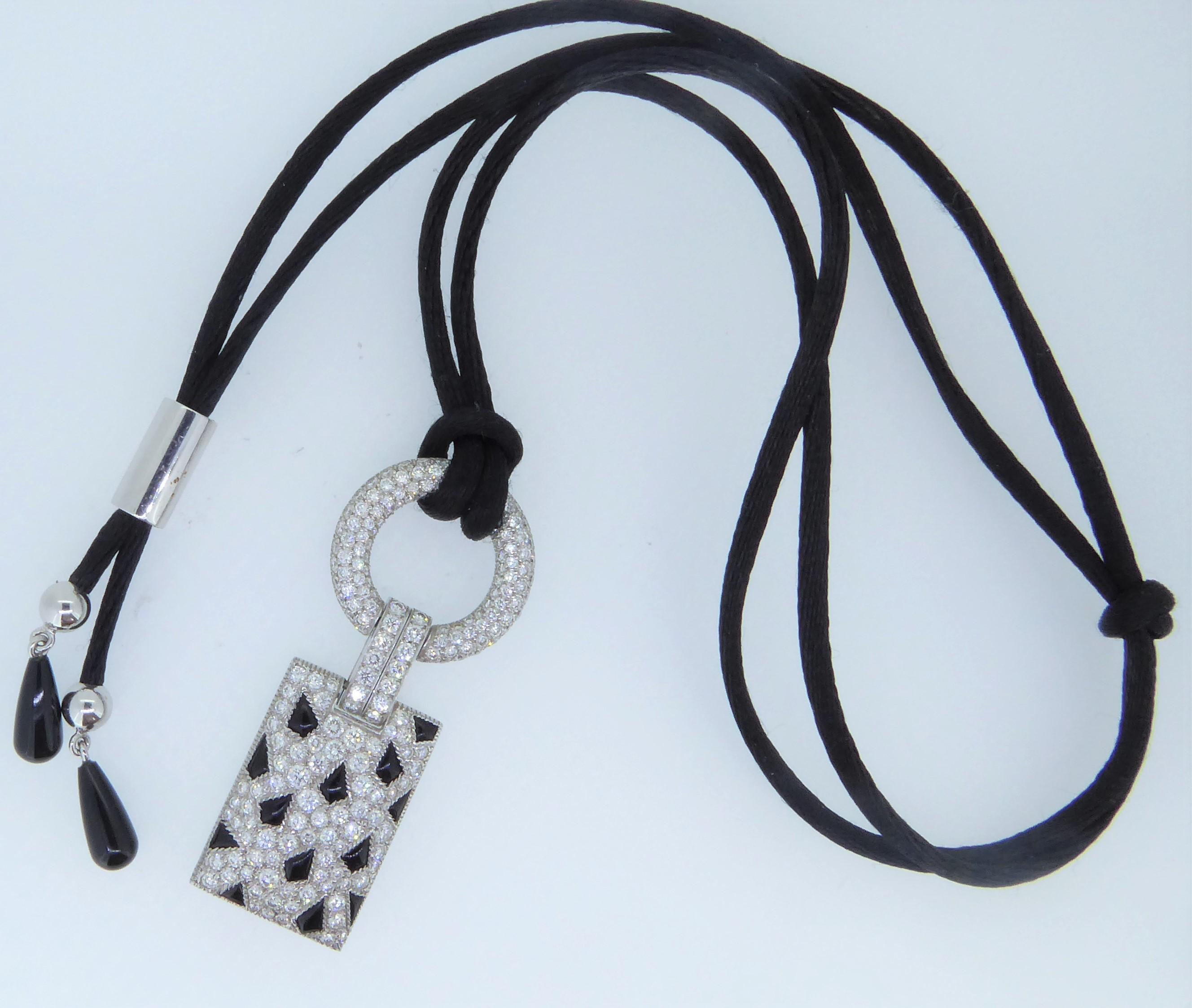 Cartier 18 Carat White Gold Onyx and Diamond Panthere Pendant Necklace In Excellent Condition In London, GB