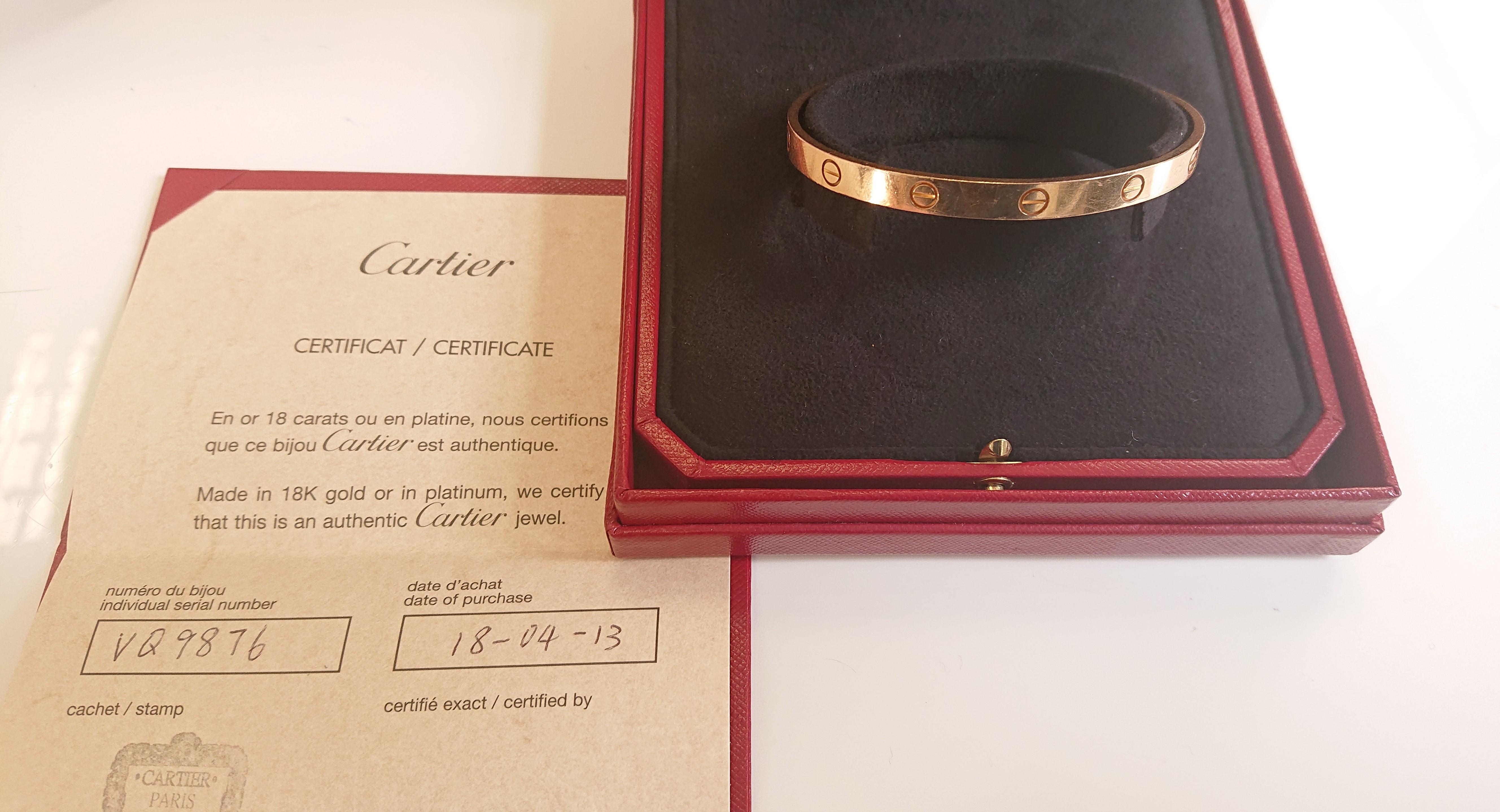A Cartier 18 Carat Yellow Gold Love Cuff Bangle. Signed 