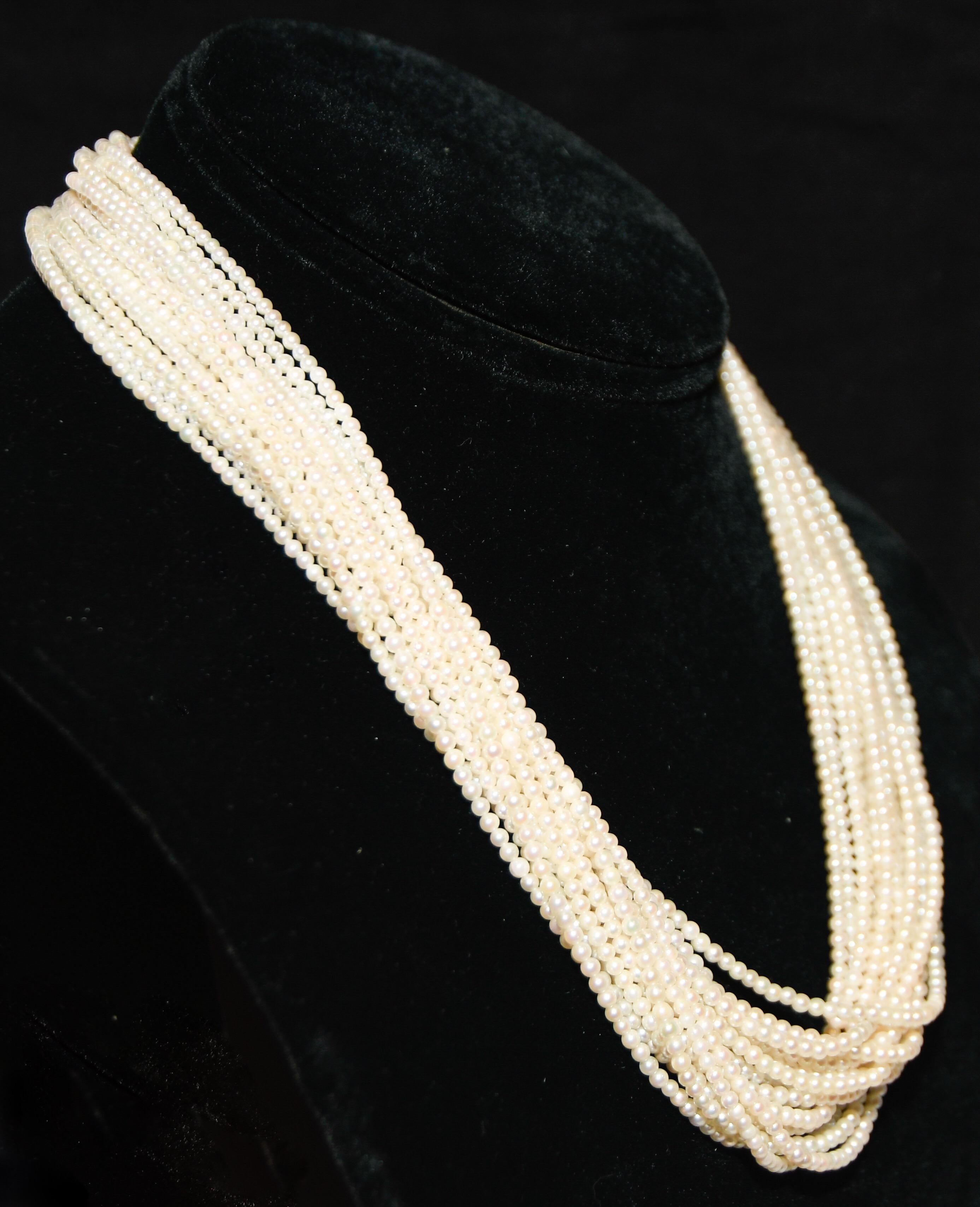 Cartier 18 Karat 16-Strand Pearl Necklace with Diamond Encrusted Clasp In Excellent Condition In Palm Beach, FL