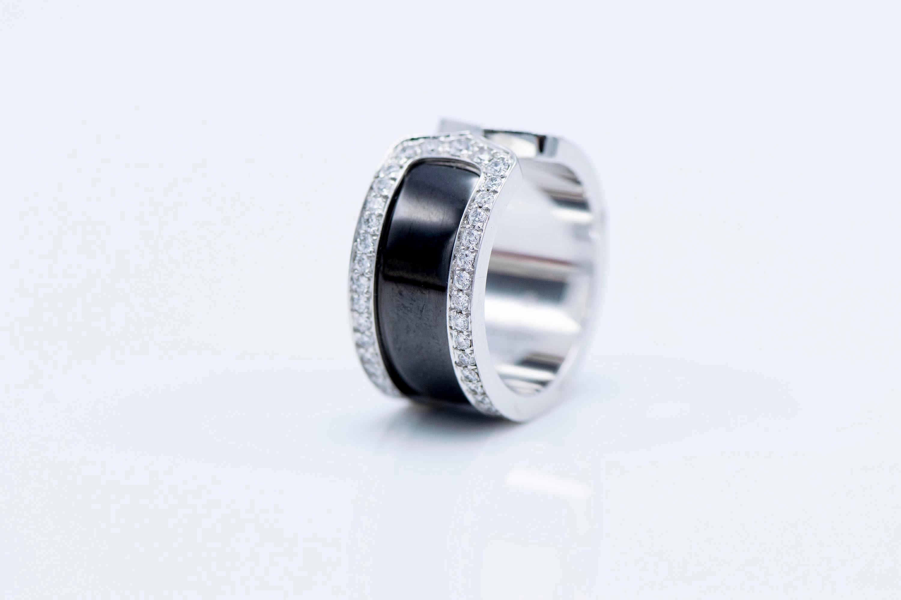 Cartier 18 Karat Double C Diamond Titanium Ring In Excellent Condition In New York, NY