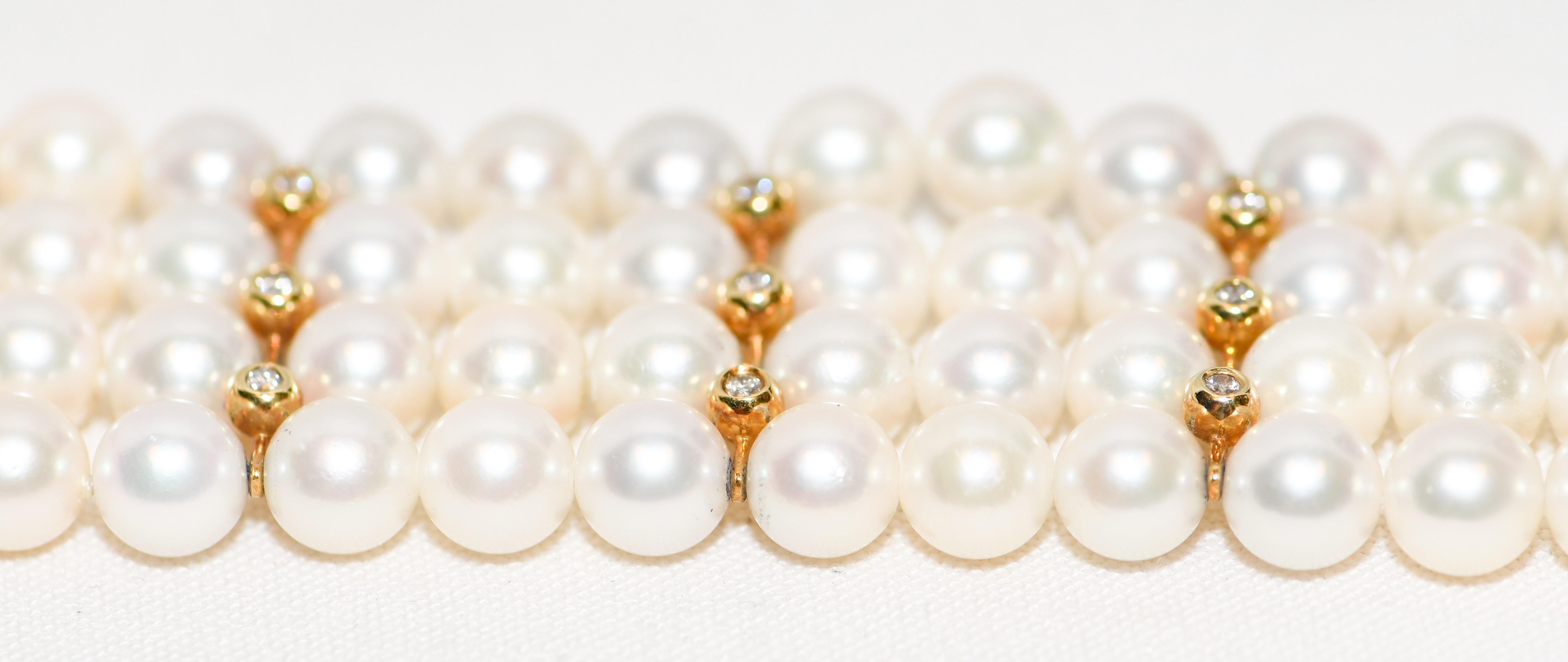 Cartier 18 Karat Four-Row Pearl and Diamond Bracelet In Excellent Condition In Palm Beach, FL