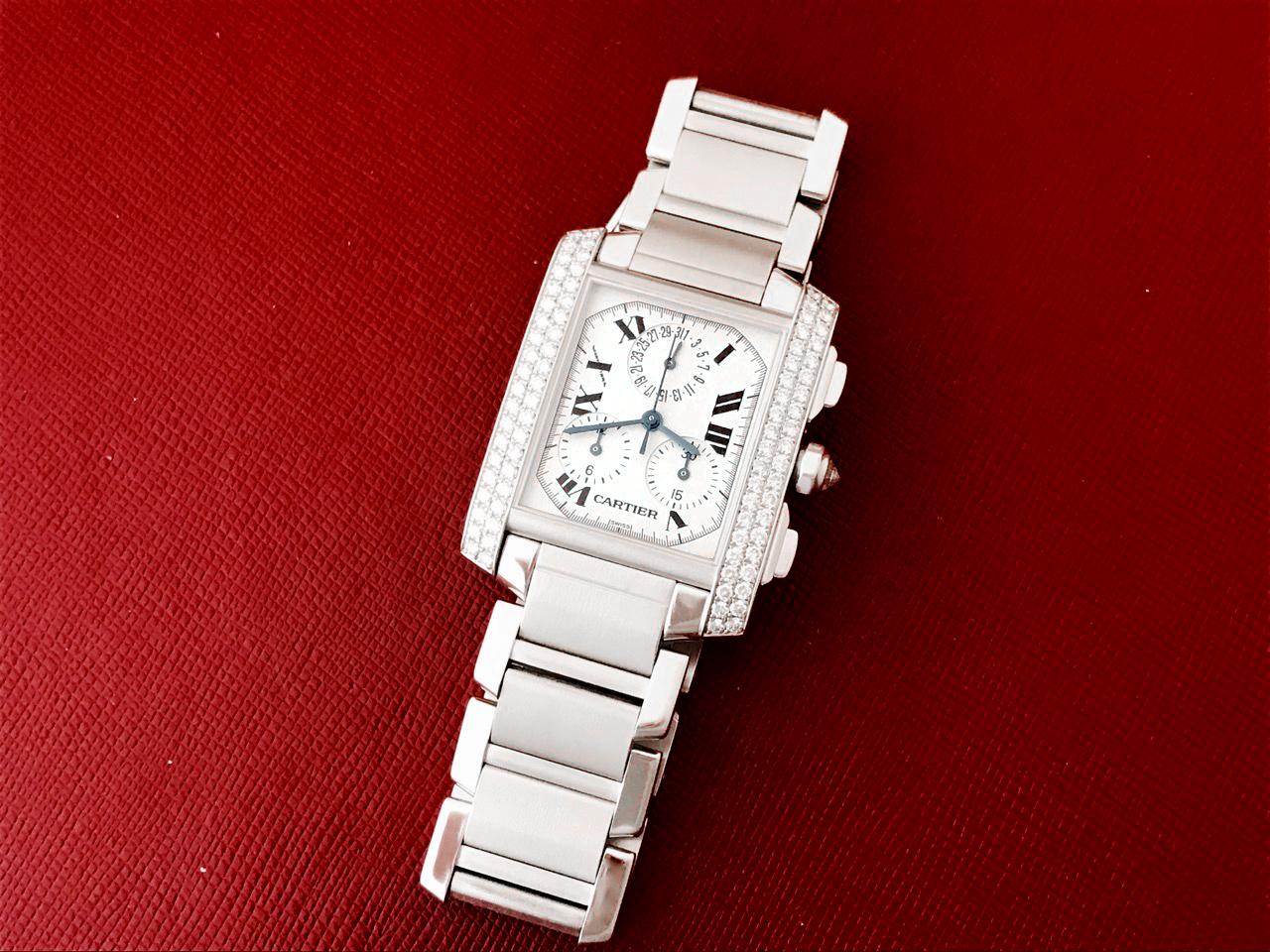 Cartier 18k White Gold Tank Francaise with Diamonds. Quartz movement with Date. Chronograph. 18K White Gold rectangular style case with Cartier two row Diamond bezel (28x36mm). 18k White Gold Cartier bracelet with deployant clasp. Silvered Dial with