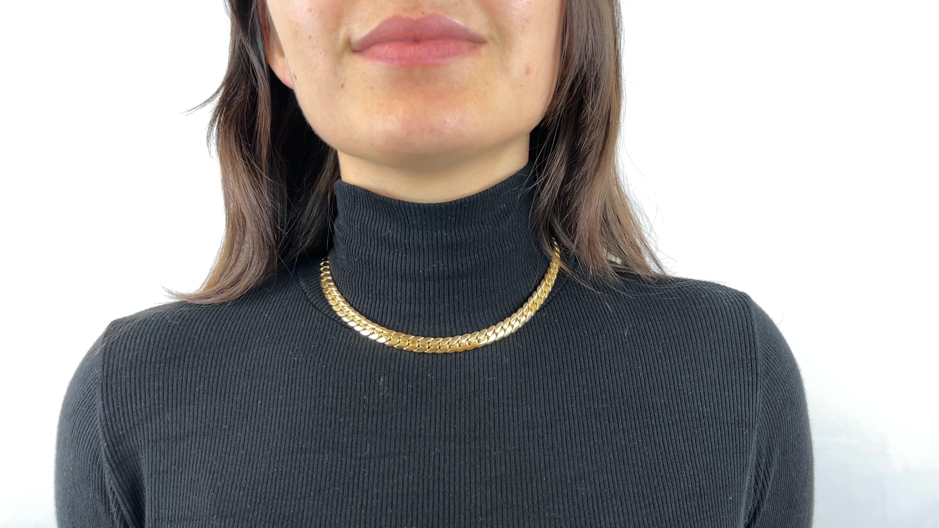 One Cartier 18 Karat Gold Cuban Link Necklace. Crafted in 18 karat yellow gold, signed Cartier, #VI5478, with French hallmarks, measuring 16 inches in length. Accompanied with original paperwork. Circa 2010s. 

About the piece: Looking for the