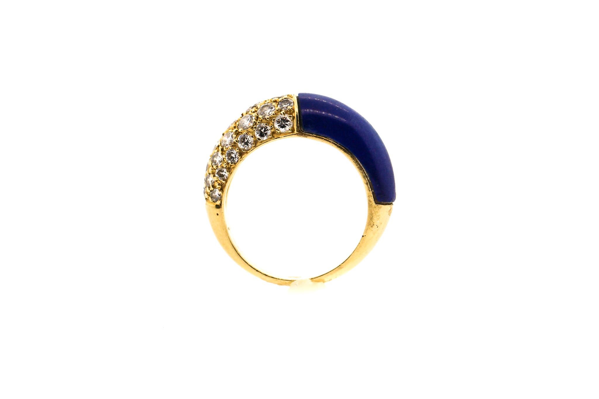 Vintage 18k Gold lapis and diamond ring by Cartier circa 1970. The lapis and the diamonds oppose each other on the finger. One side is set with 30 modern round brilliant diamonds weighing about 1.20 cts total. The ring is slightly domed and would