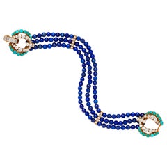 Cartier 18 Karat Gold, Lapis Luzuli, Turquoise and Diamond Multistrand Bracelet