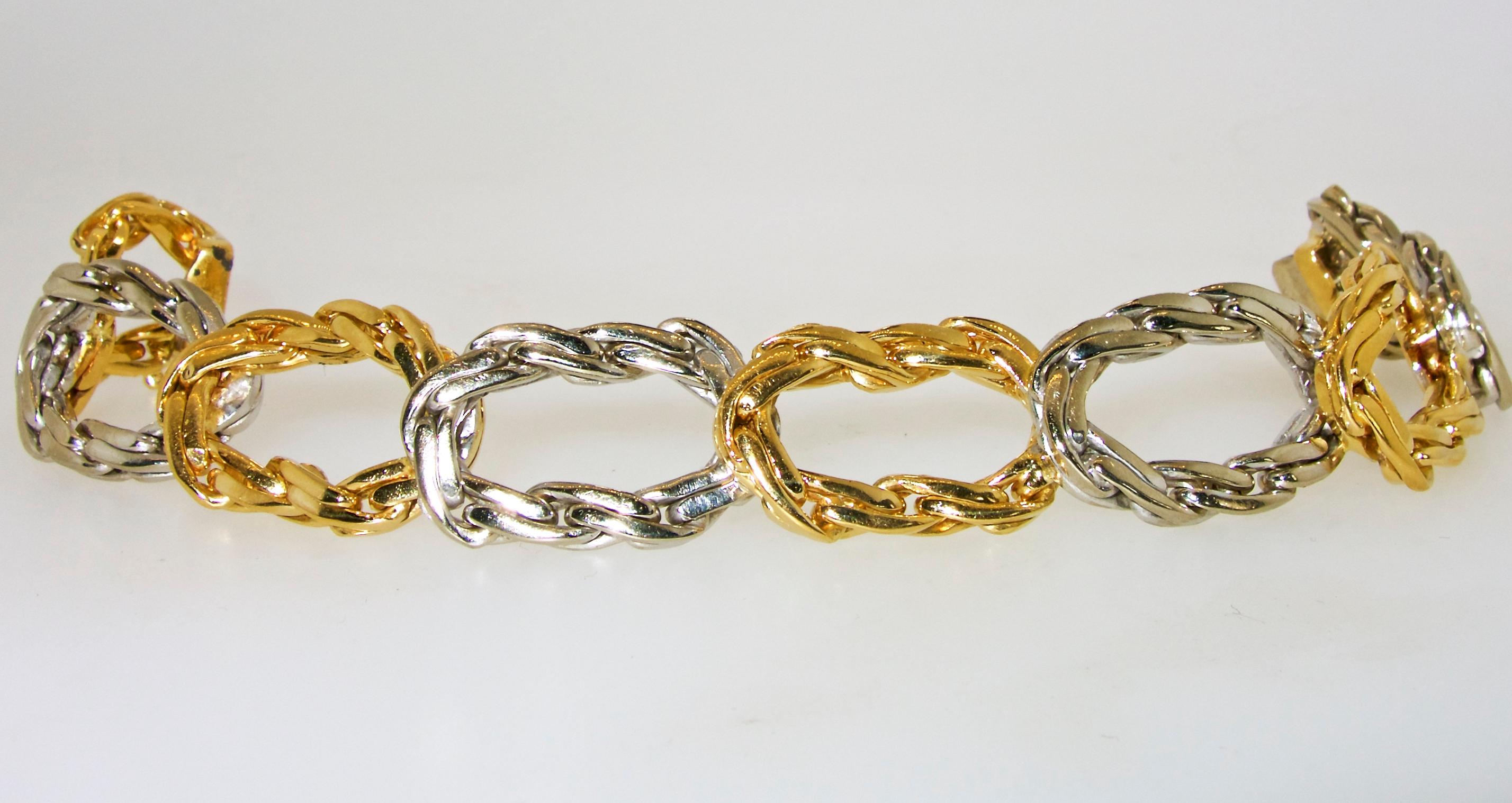 Cartier London substantial and heavy yellow and white gold bracelet, 8 inches long, signed and numbered with JC hallmark for Jacque Cartier and 750 for 18K.