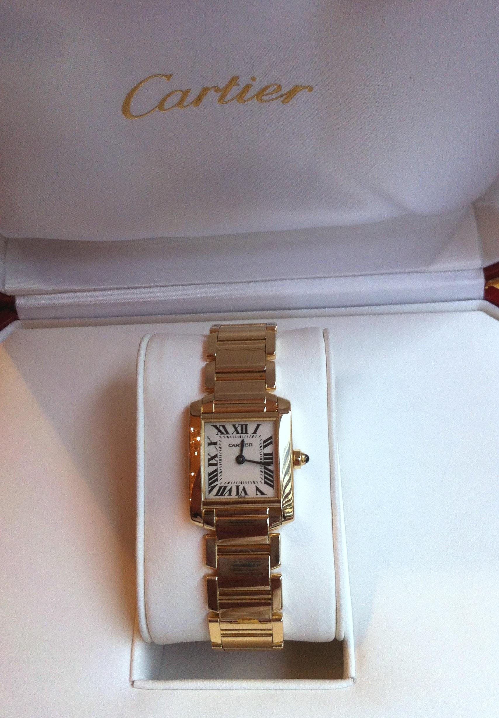 Cartier Lady Tank Française in 18K yellow gold, 750/1000eme

Quartz movement, Roman Dial.

Signed Cartier and numbered.

Within its original box !

Dimensions:  25 X 20 mm

Very good conditions ! Pre-owned watch in great condition keeping perfect