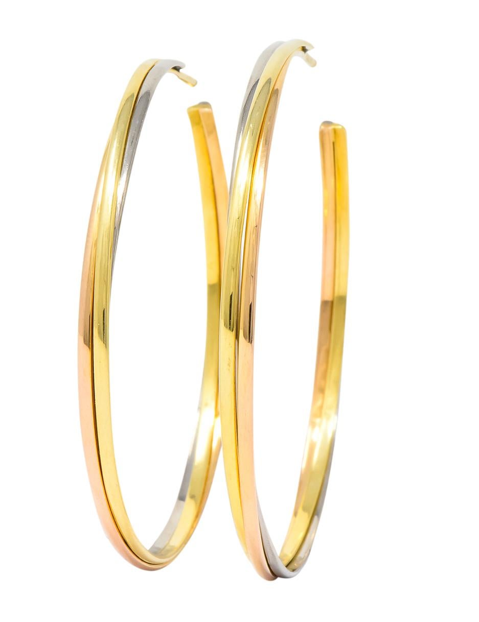 Cartier 18 Karat Gold Tri-Gold Trinity Hoop Earrings In Excellent Condition In Philadelphia, PA