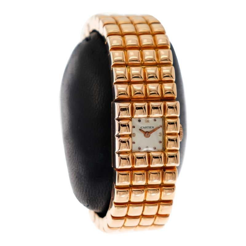 FACTORY / HOUSE: Cartier by Movado 
STYLE / REFERENCE: Art Deco Style Bracelet Watch
METAL / MATERIAL: 18kt Rose
CIRCA / YEAR: 1940's / 50's
DIMENSIONS / SIZE: Length 20mm X Width 20mm
MOVEMENT / CALIBER: Manual Winding / 17 Jewels 
DIAL / HANDS: