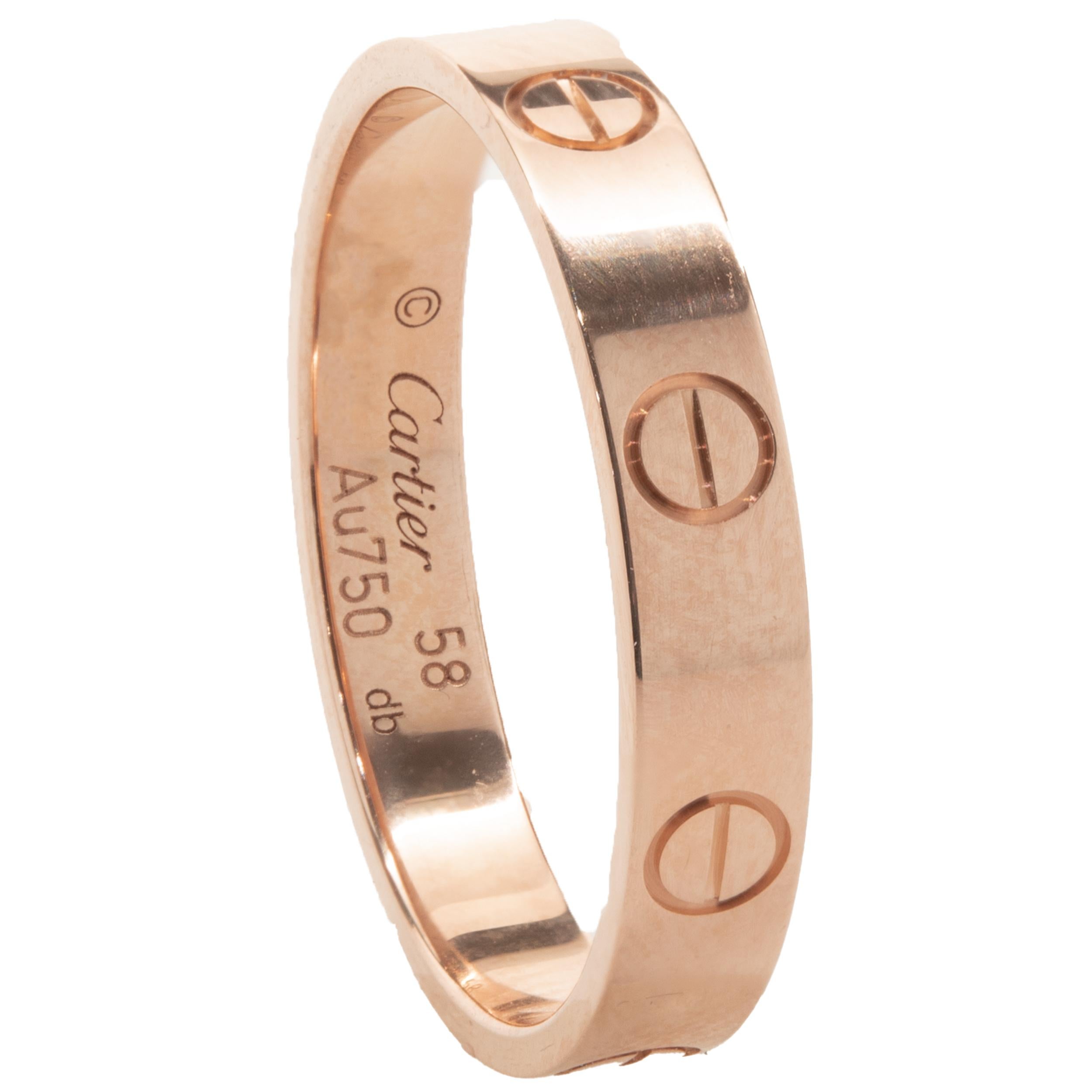 Designer: Cartier
Material: 18K rose gold
Dimensions: ring top measures 3.7mm wide
Weight: 3.63 grams
Size: 58 (8.25 US)
Serial # OLFXXX

Complete with original box and papers
Guaranteed authentic by seller
