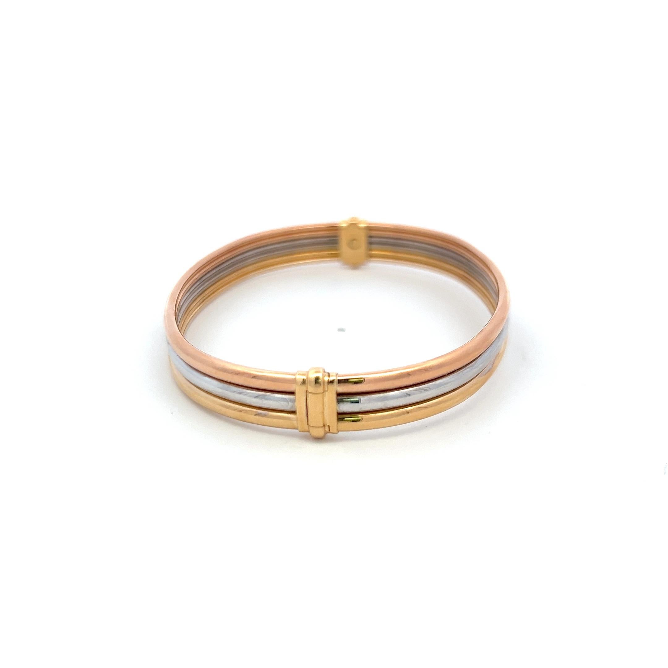Cartier 18 Karat Tri Color Gold Bangle Trinity Bracelet With Box In Good Condition In New York, NY