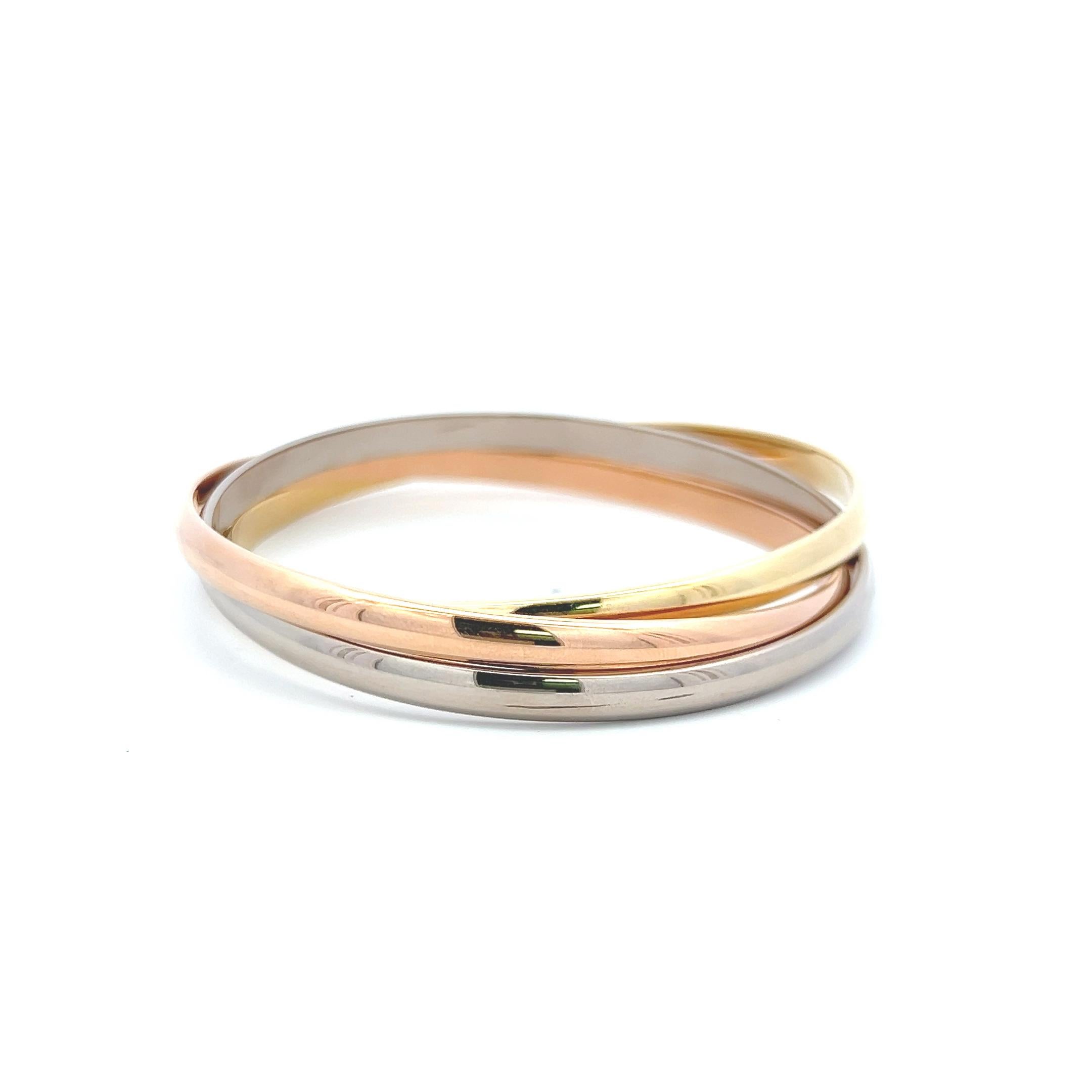 Cartier 18 Karat Tri Color Gold Bangle Trinity Bracelet with Paper Pour femmes en vente