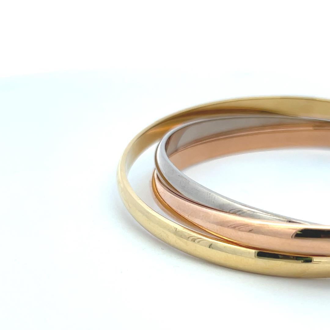 Cartier 18 Karat Tri Color Gold Bangle Trinity Bracelet with Paper en vente 3