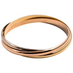 Cartier 18 Karat Tri-Color Gold Trinity Rolling Bangle Bracelet