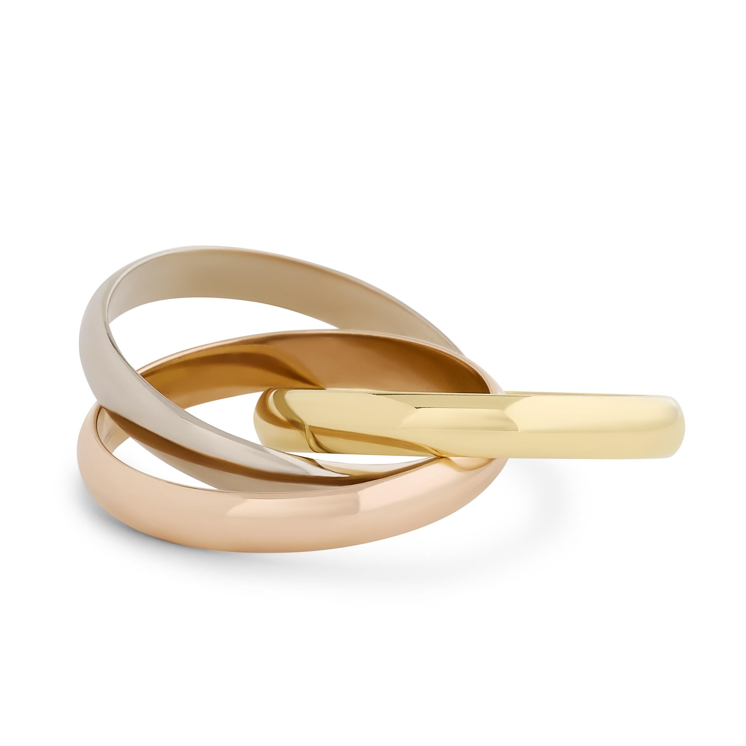 Cartier 18 Karat Tri-Gold Rolling Band Ring In Good Condition For Sale In Philadelphia, PA