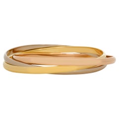 Cartier 18 Karat Tri-Gold Trinity Rolling Bangle Bracelet
