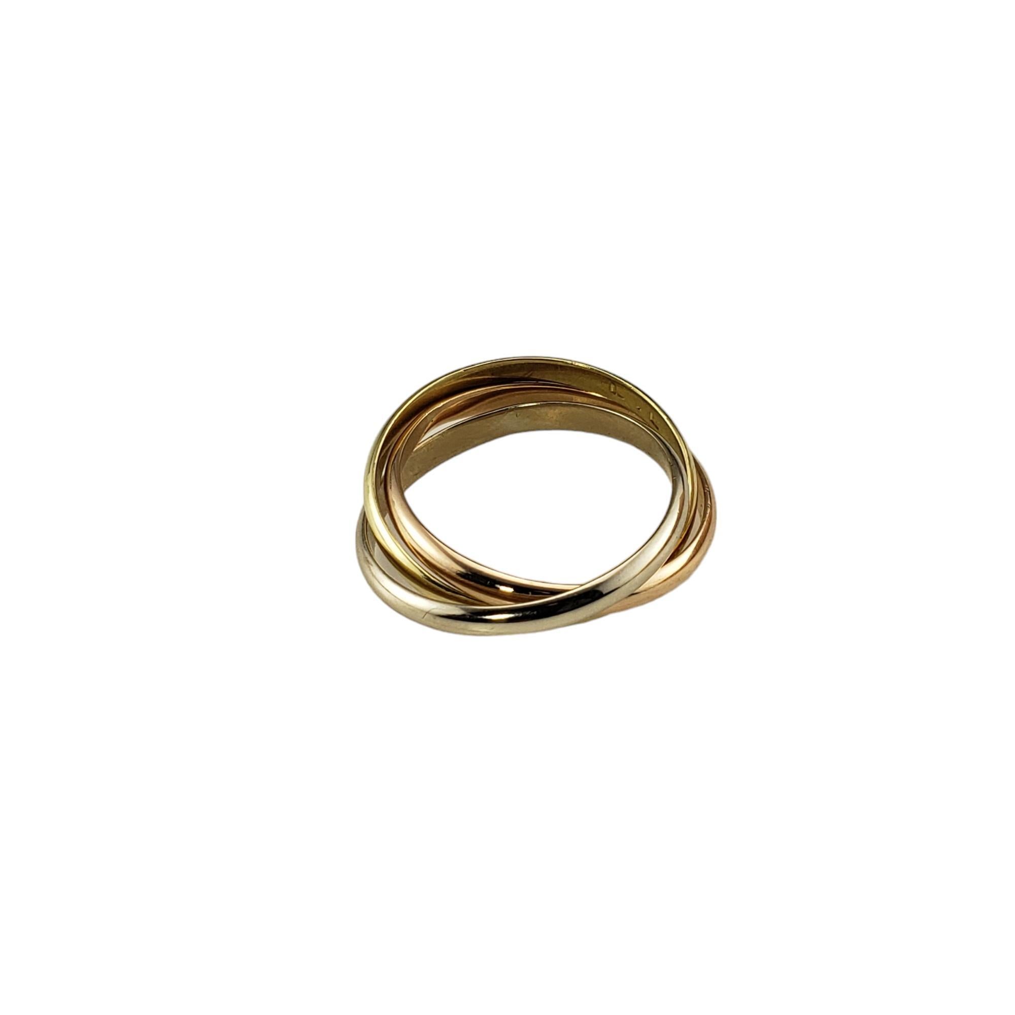 Vintage Cartier 18 Karat Tricolor Rolling Trinity Ring Size 8.5

This elegant three band ring by Cartier is crafted in beautifully detailed 18K yellow, white and rose gold.  

Width: 5 mm.  Each band measures 2 mm.

Inner inscription reads 