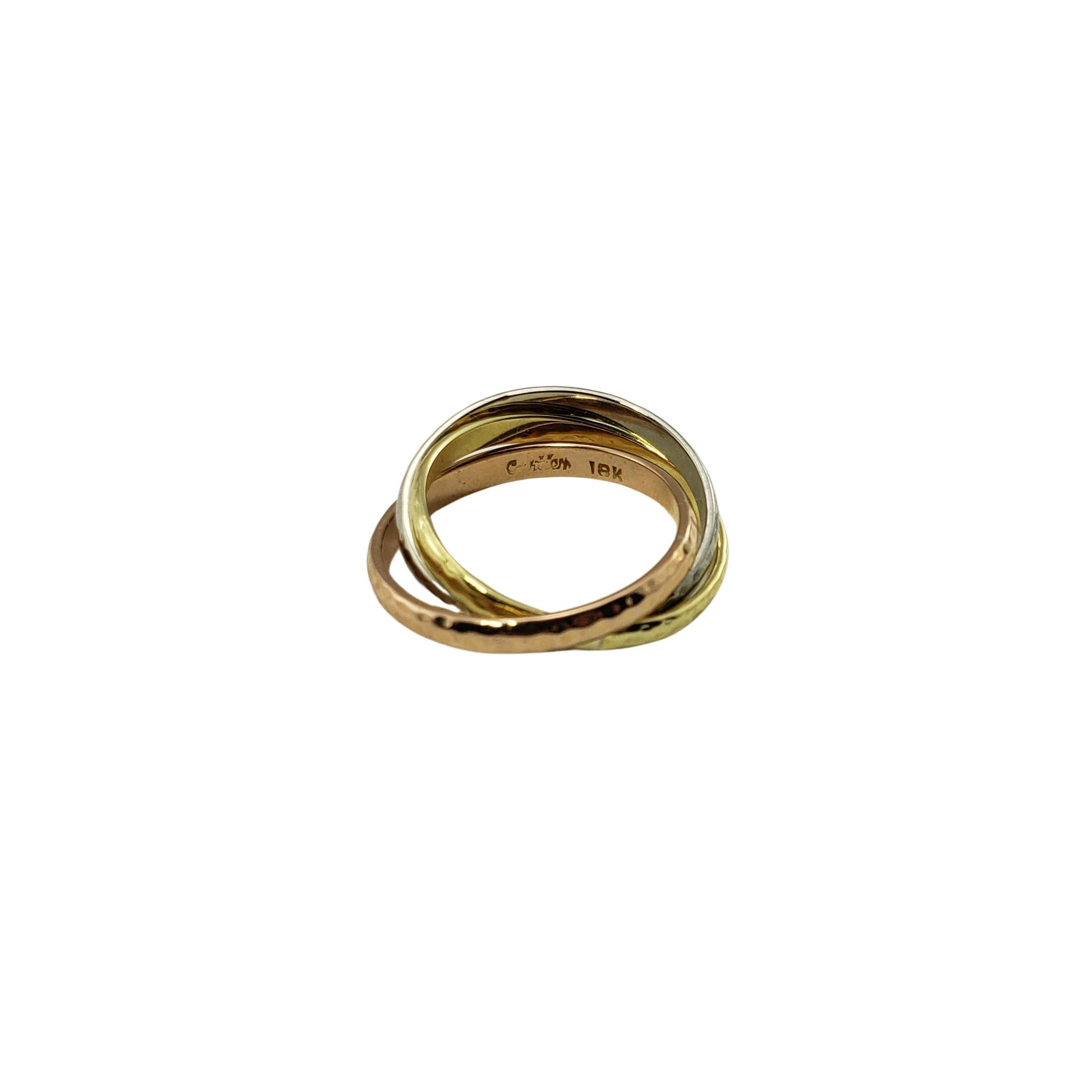 Cartier 18 Karat Tricolor Trinity Rolling Ring-

This elegant Cartier rolling ring features a trio of connected bands crafted in 18K yellow, white and rose gold.  
Width of each band: 3 mm.

Ring Size: 6.5

Weight:  4.1 dwt. /  6.4 gr.

Hallmark: 