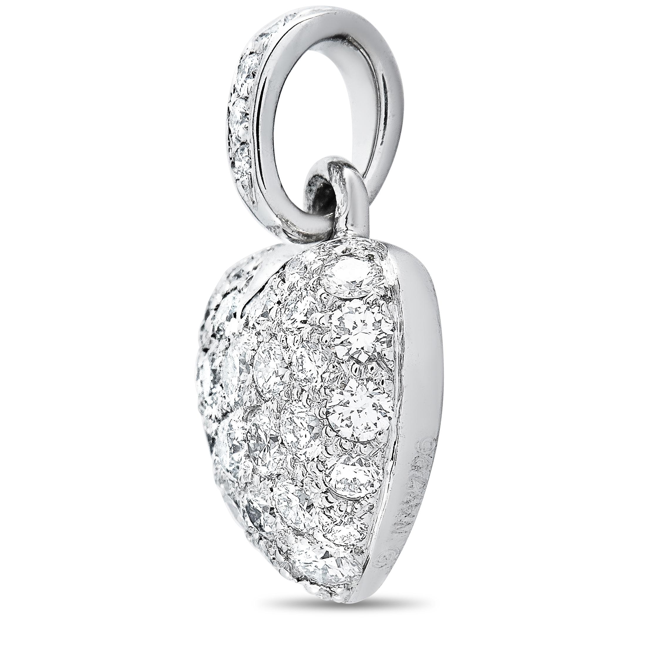 This Cartier heart pendant is made of 18K white gold and embellished with diamonds that feature F color and VS1 clarity and amount to 0.50 carats. The pendant weighs 2.2 grams and measures 0.62” in length and 0.37” in width.
 
 Offered in estate