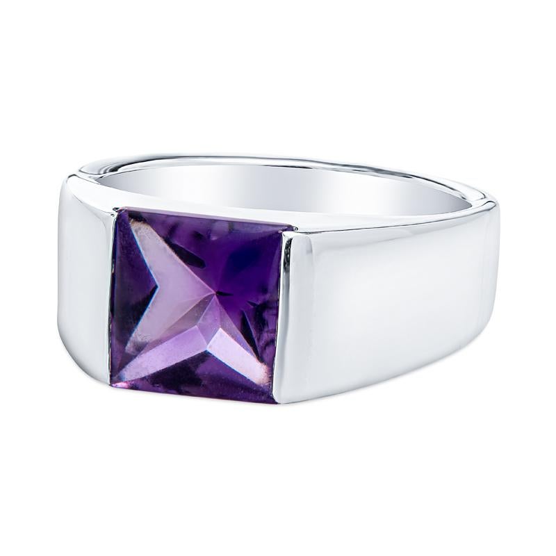 This ring from Cartier is crafted in 18 karat white gold and features a square cabochon cut amethyst at the center. This is a very simple modern ring but packs a punch. It can be worn daily or saved for special occasions. It is a size 50 which is