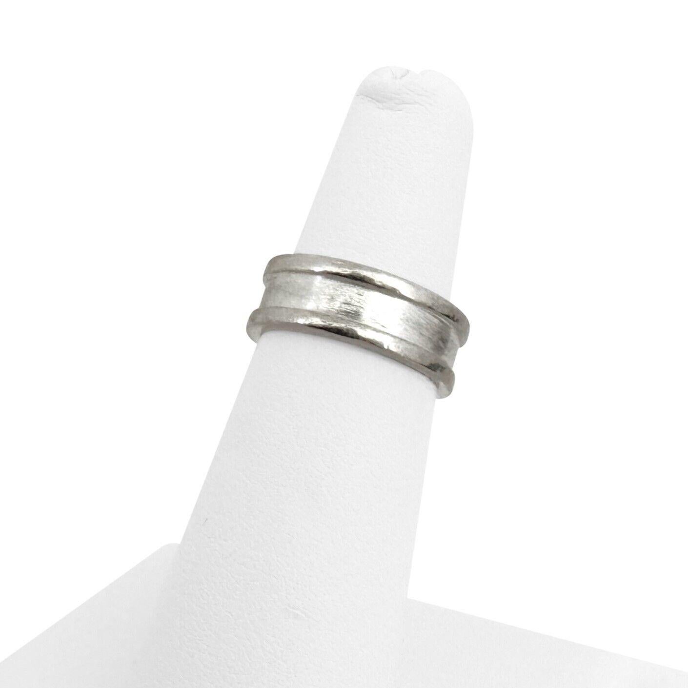 Cartier 18k White Gold C de Cartier Band Ring Size 4.75

Condition:  Excellent Condition, Professionally Cleaned and Polished
Metal:  18k Gold (Marked, and Professionally Tested)
Weight:  7.1g
Width:  6mm
Size	:  49 (US Size 4.75)
Markings:  