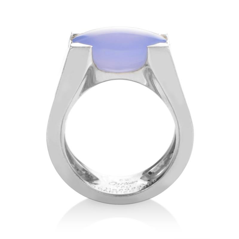 With a metallic, subtle appearance, the focus of this ring's design is on the beautiful, oval chalcedony stone, fit elegantly on the very top, while the 18K white gold body seems to act merely as a pedestal for this polished gem.