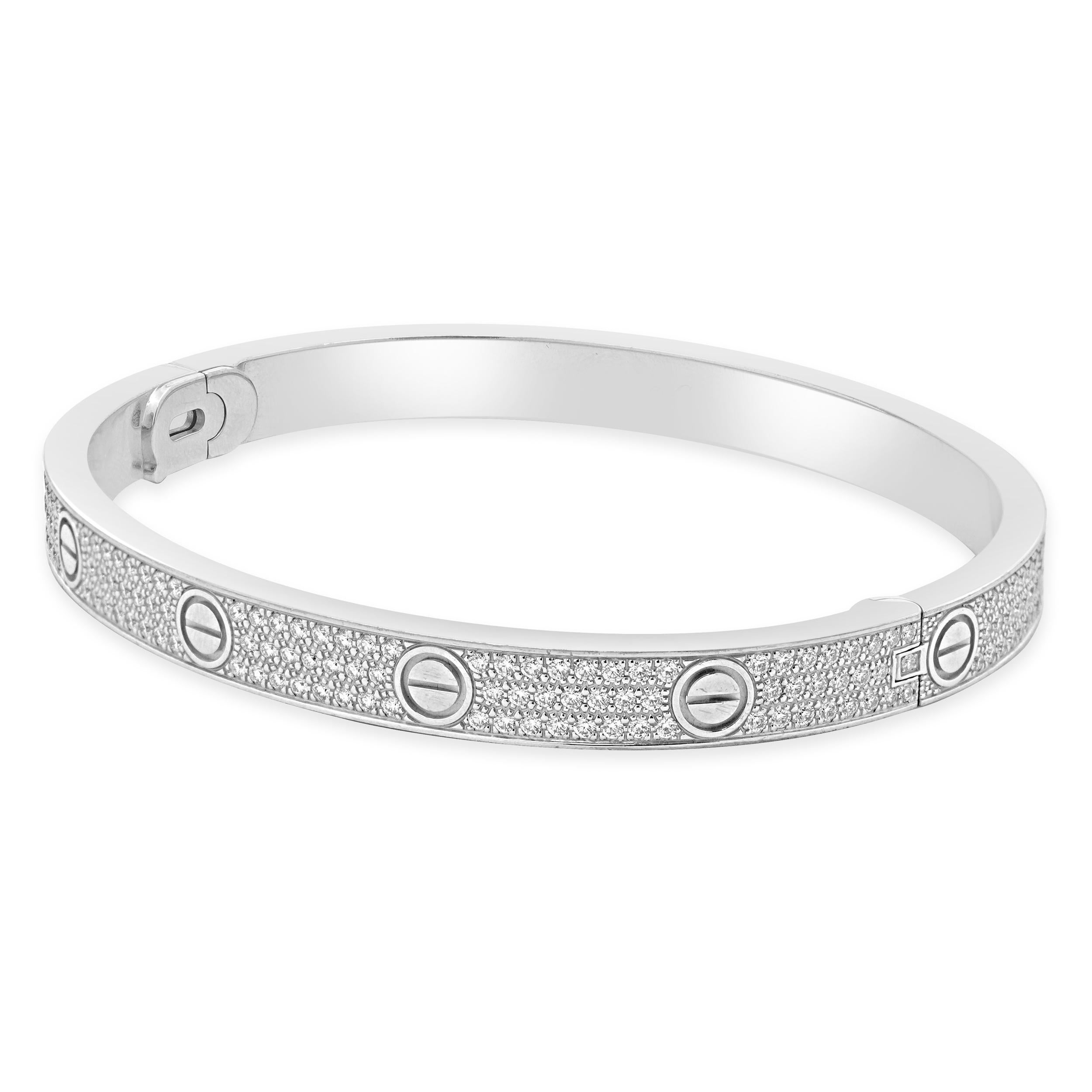 Designer: Cartier
Material: 18K white gold
Diamond: 204 round brilliant cut = 1.99cttw
Color: G
Clarity: VS2
Serial # STLXXX
Size: 20
