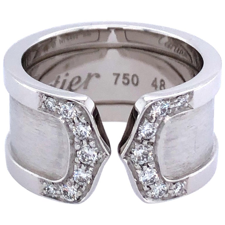 Anello doppia C con diamante Cartier in oro bianco 18 carati in vendita su  1stDibs
