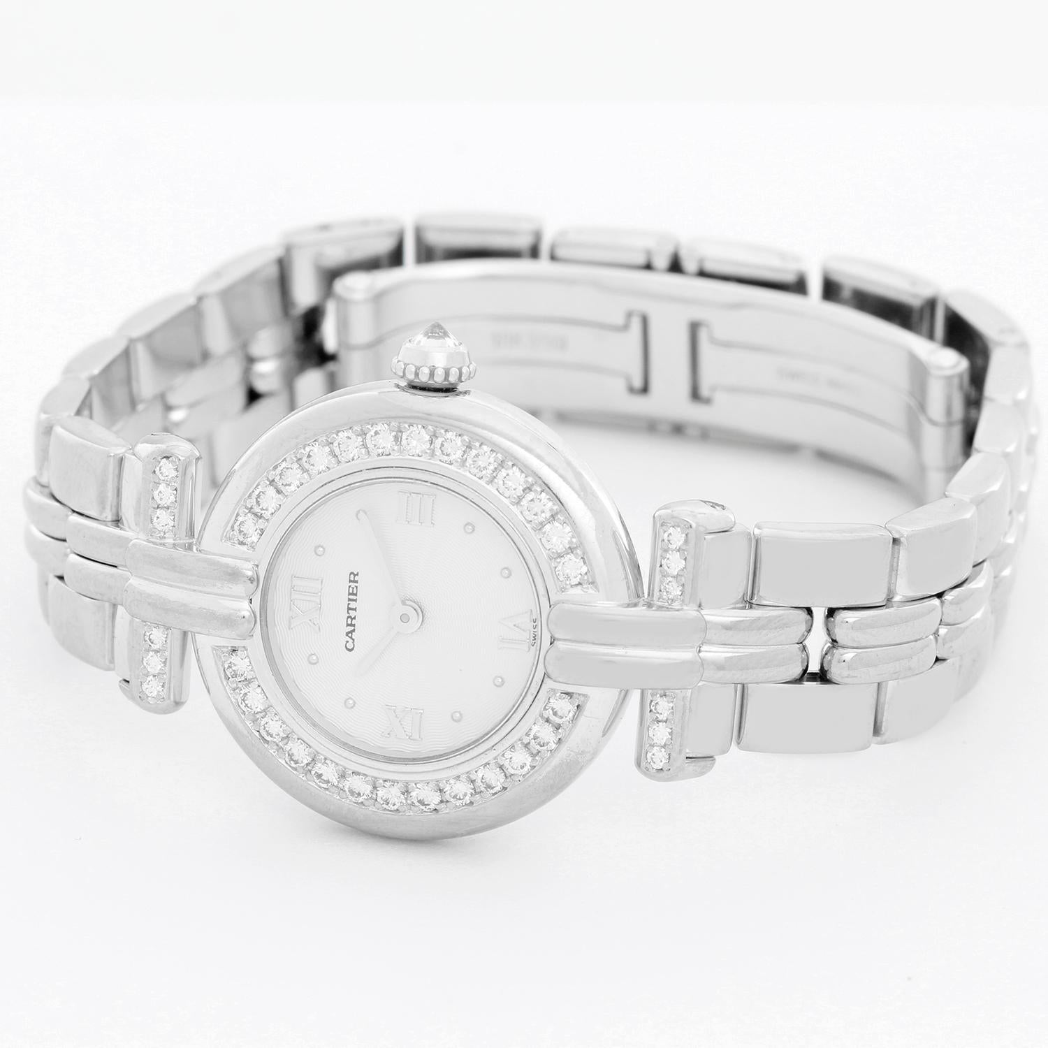 Cartier 18K White Gold Diamond Ladies Watch - Quartz. 18K White gold case ( 24 mm ); diamond bezel. Silver guilloche dial with Roman numerals. 18K White gold bracelet with diamond lugs. Pre-owned with custom box.